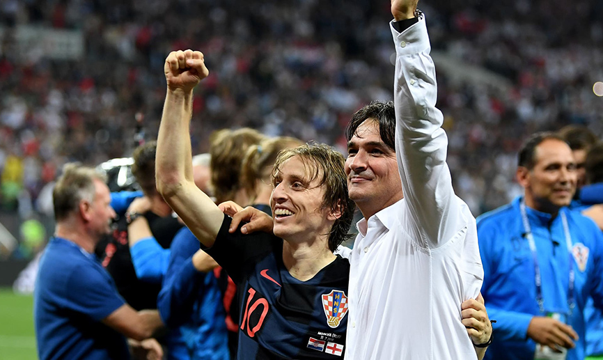 Modric celebra una victoria junto a su seleccionador