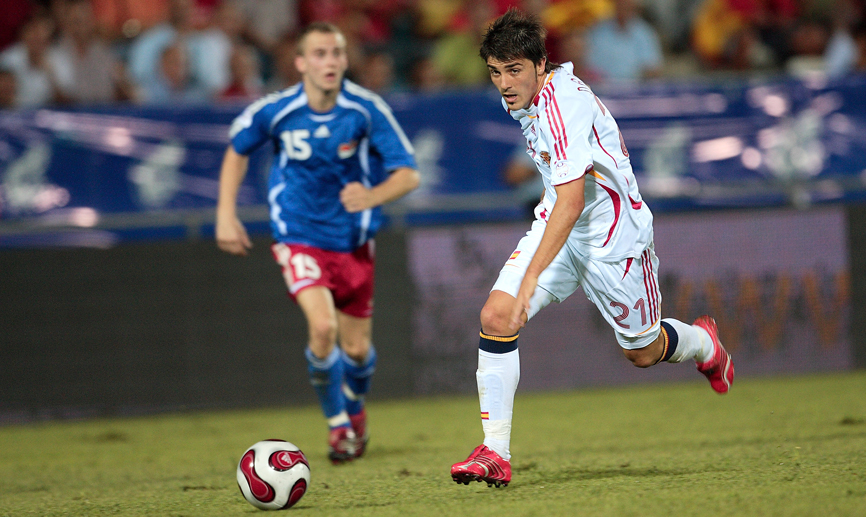 Villa corriendo en un momento del partido