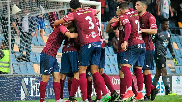 Los jugadores del Pontevedra celebran un tanto