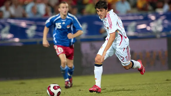 Villa corriendo en un momento del partido